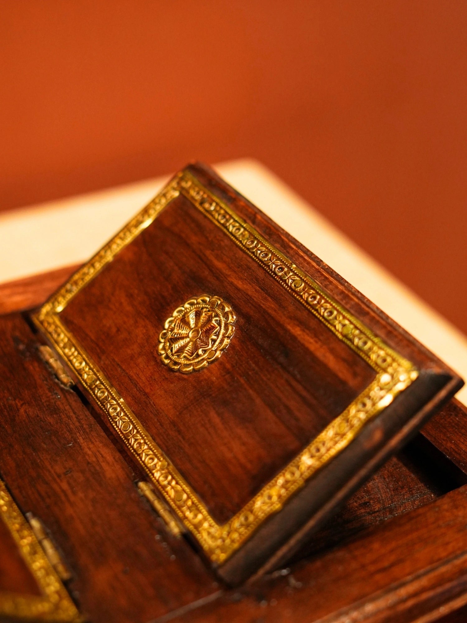 A vintage brown wooden book stand made with wood and brass and a perfect stand to keep a book and keep worship utility