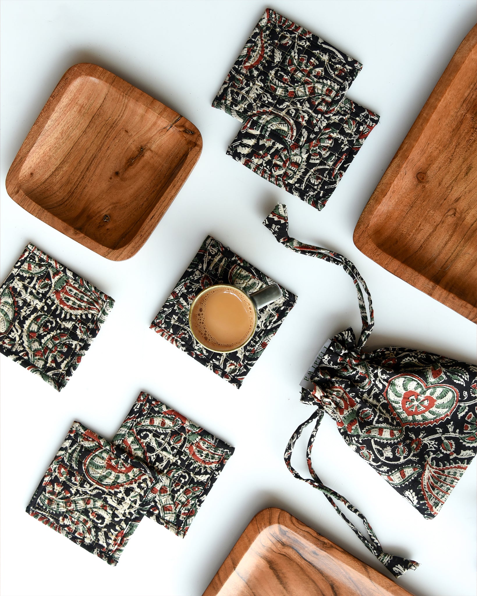 Piharwa Hand made Fabric Coasters set with a Potli(Set of 6)