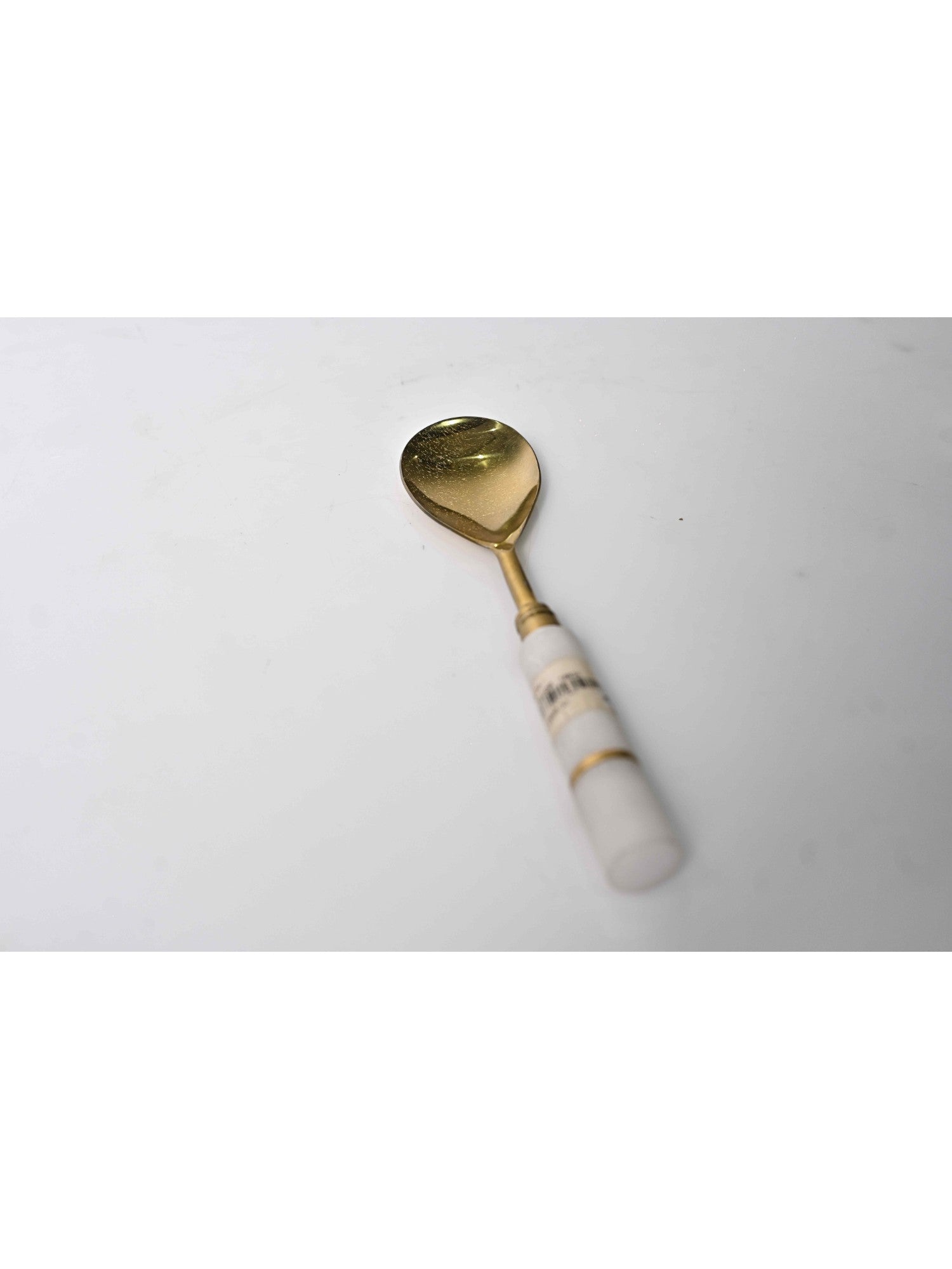 Elements of Piharwa Golden serving spoon with marble round handle