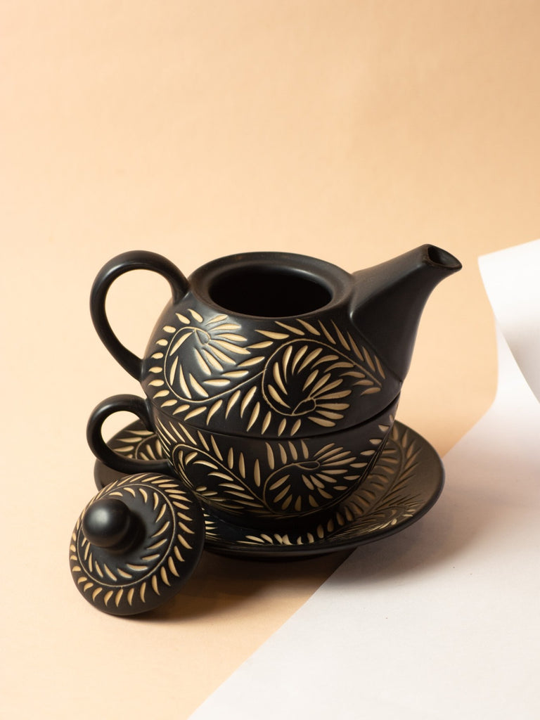 Elements of Piharwa Kettle With A Mug And Saucer