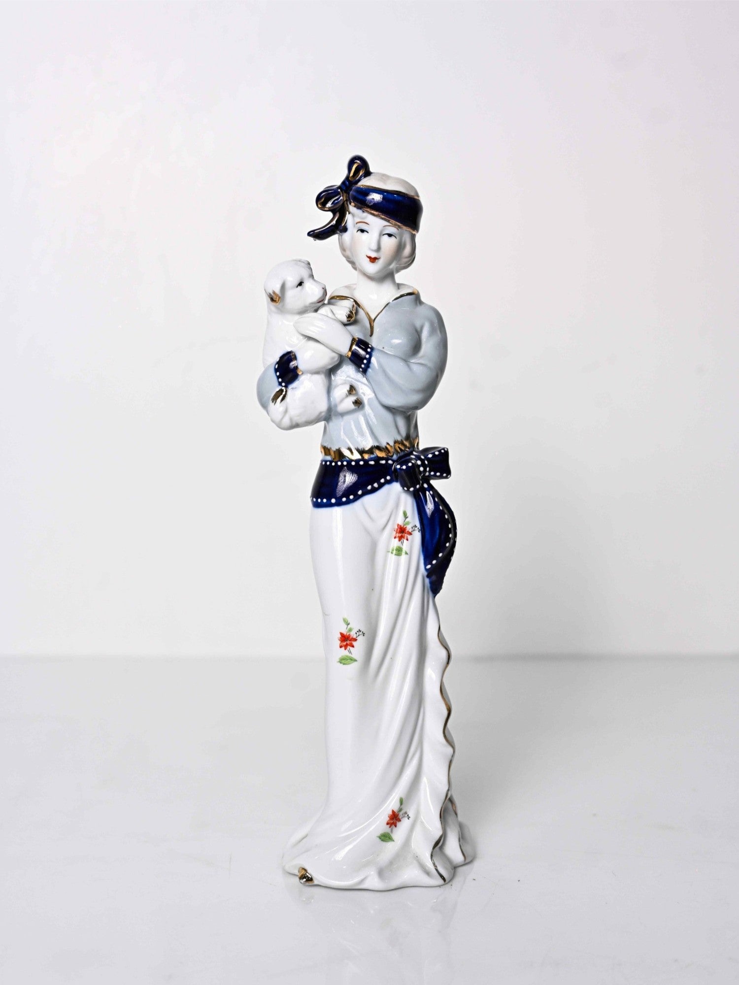 Elements of Piharwa Porcelain doll with puppy