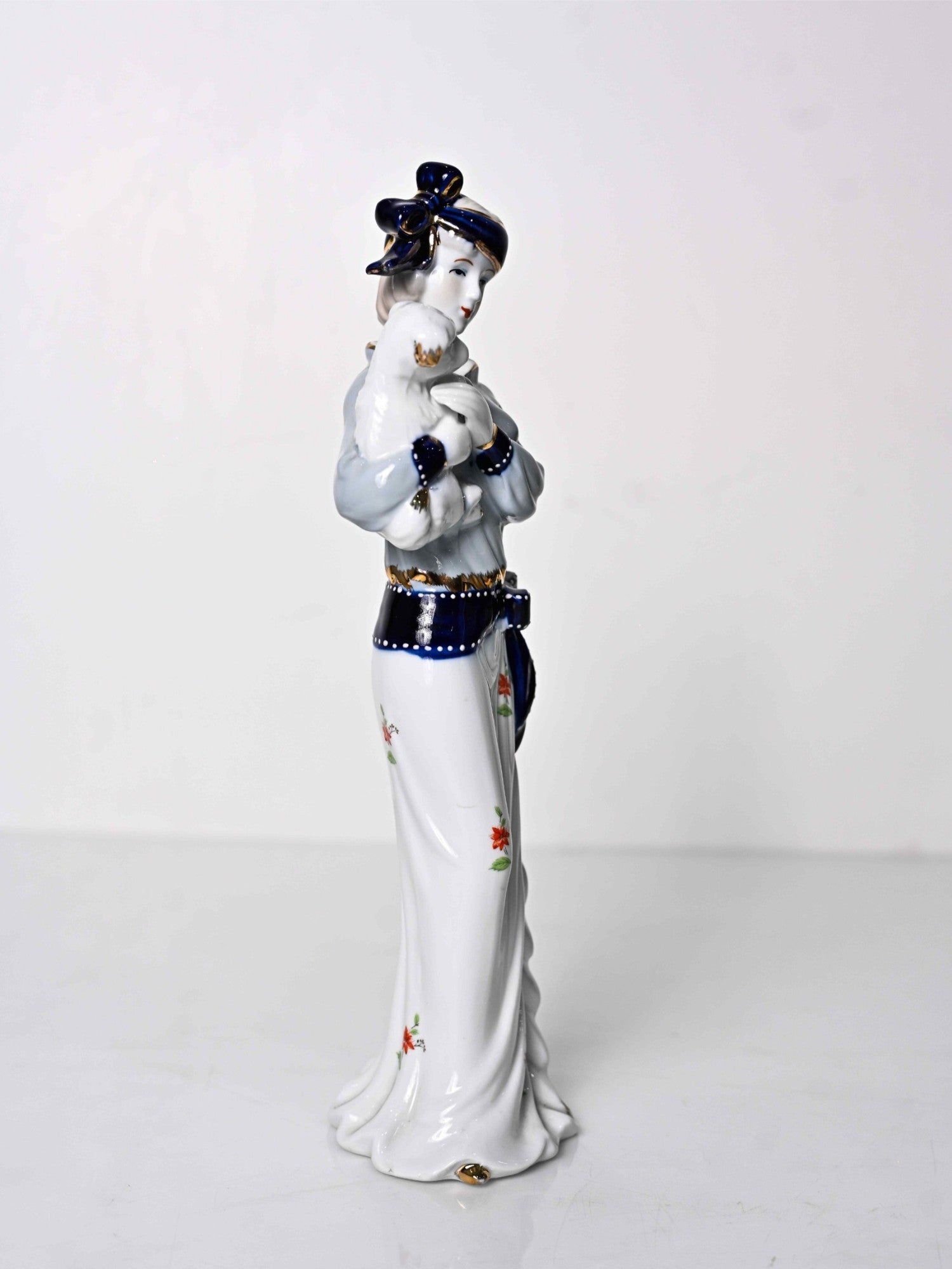 Elements of Piharwa Porcelain doll with puppy