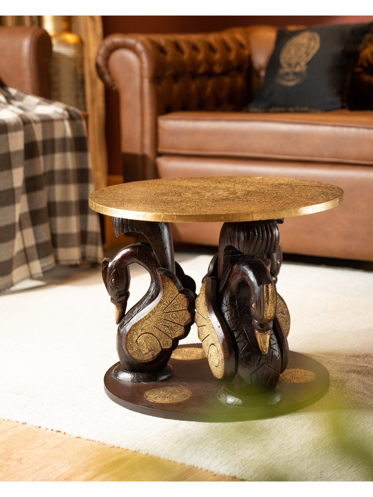 Elements of Piharwa Swan design wooden round table with brass fitted top