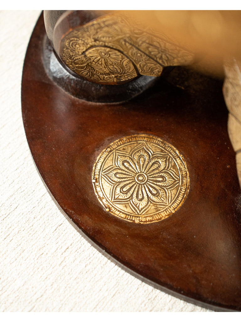 Elements of Piharwa Swan design wooden round table with brass fitted top