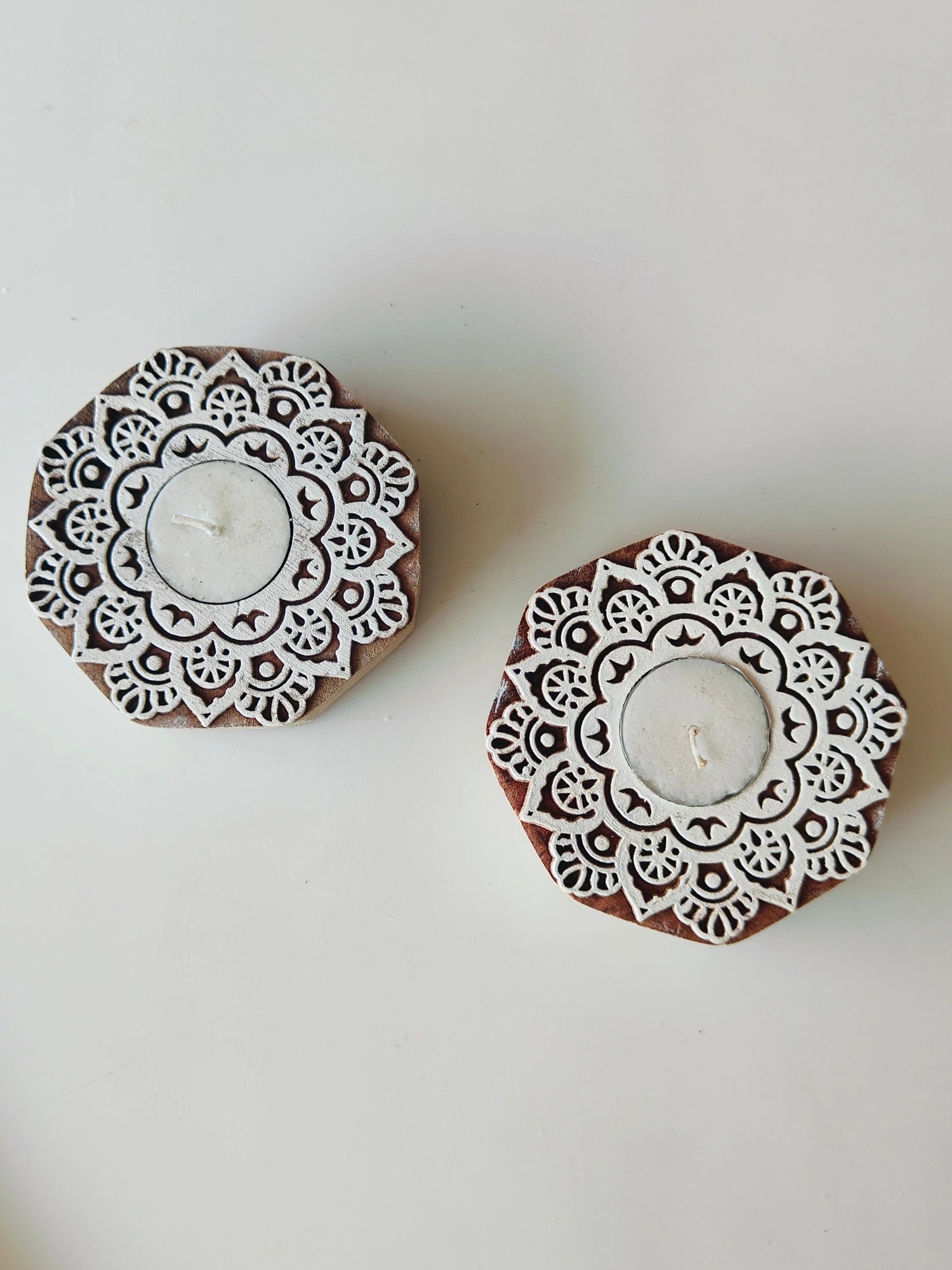 Handmade wooden blocks used for putting tea lights, perfect for any decor
